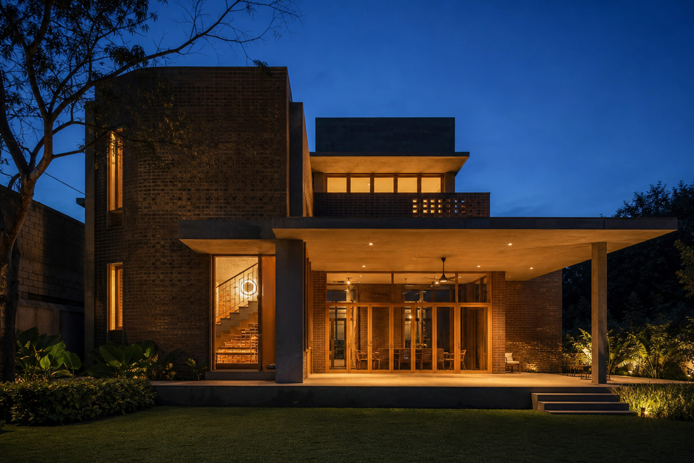 House at dusk with warm interior light